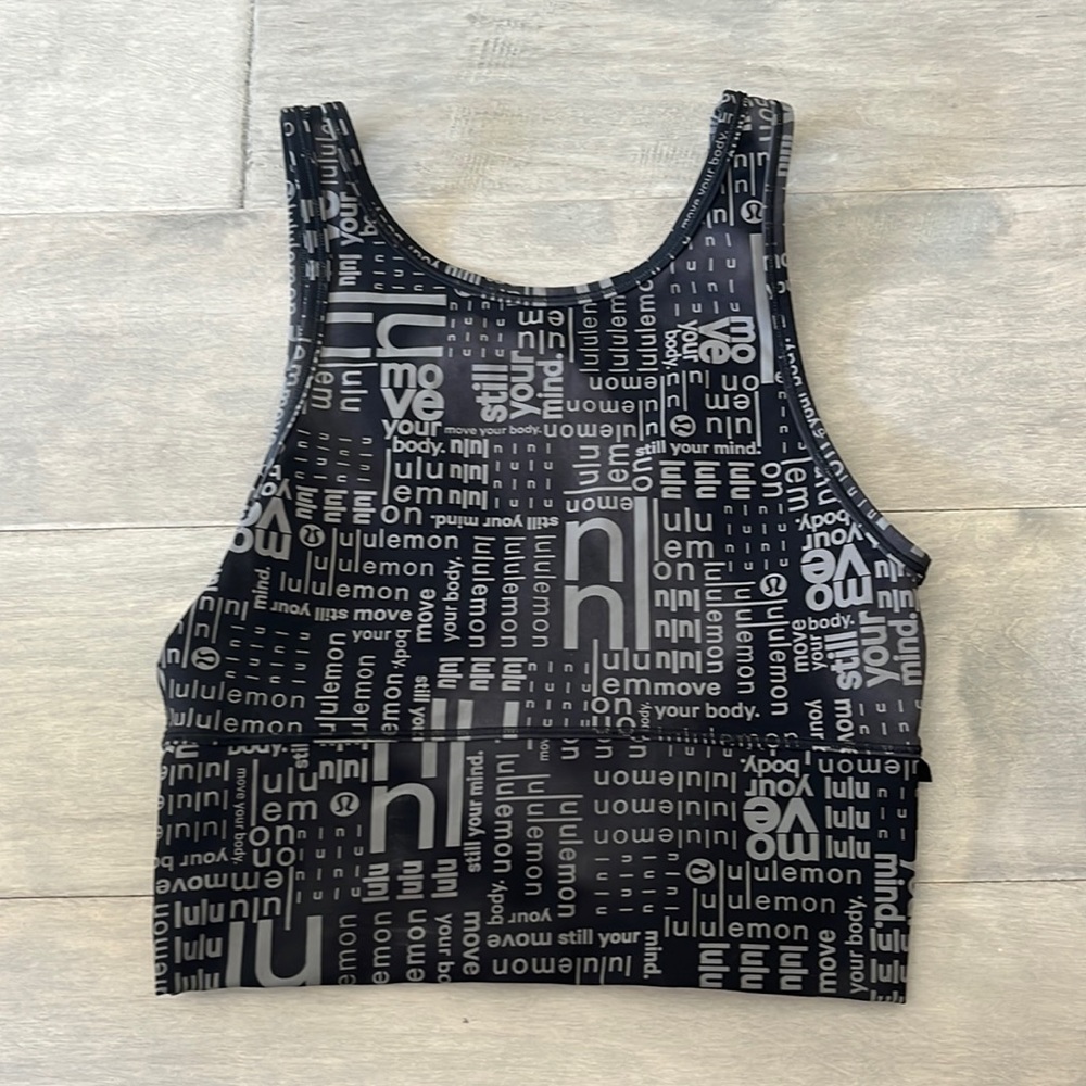 Lululemon power pivot everlux tank top size 4 black Lulu logo color
